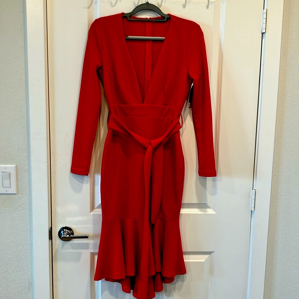 Red zip up dress with sash around waist never been worn. Perfect condition.